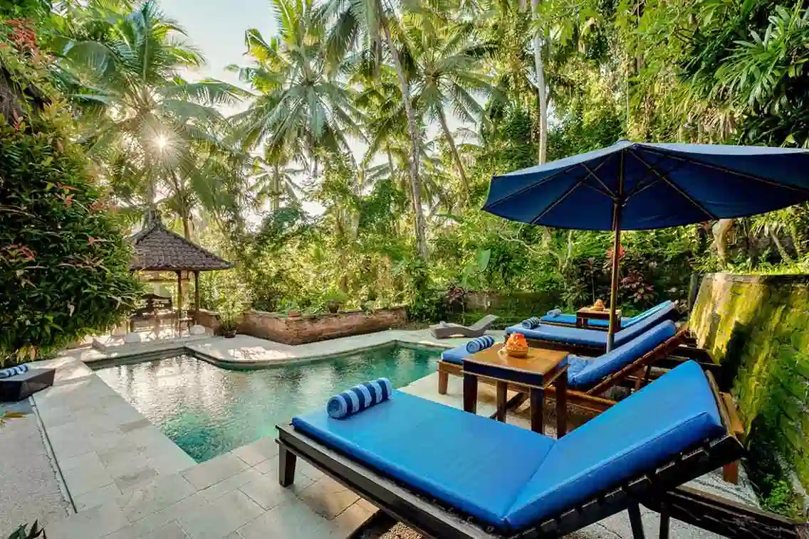 Traditional Balinese architecture at Alam Indah Resort in Ubud surrounded by tropical gardens