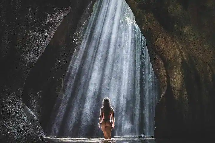 Tukad Cepung Waterfall - Mystical cave waterfall with light beams in Bali